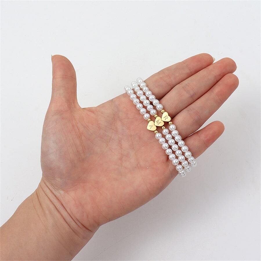 Parel armband met persoonlijk ontwerp, perfect als elegant polssieraad.
