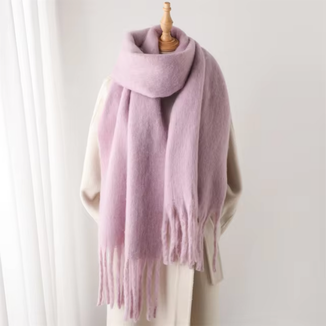 Luxe en stijlvolle sjaal met lange franjes voor een trendy look.