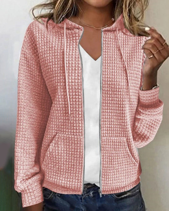 Fiona Vrouwelijke comfortabele hoodie met een sportieve uitstraling, voorzien van een ritssluiting en praktische zakken. Perfect voor casual outfits en dagelijkse activiteiten.