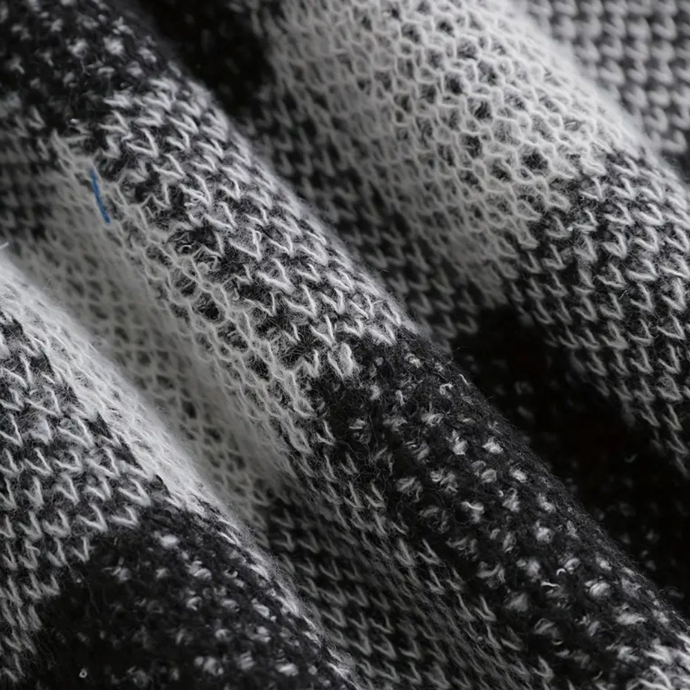 Detail van de warme binnenvoering en zachte stof.