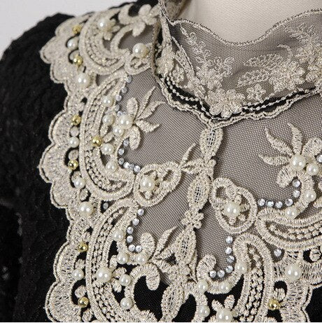 Bella | Elegant blouse with net and embroidery