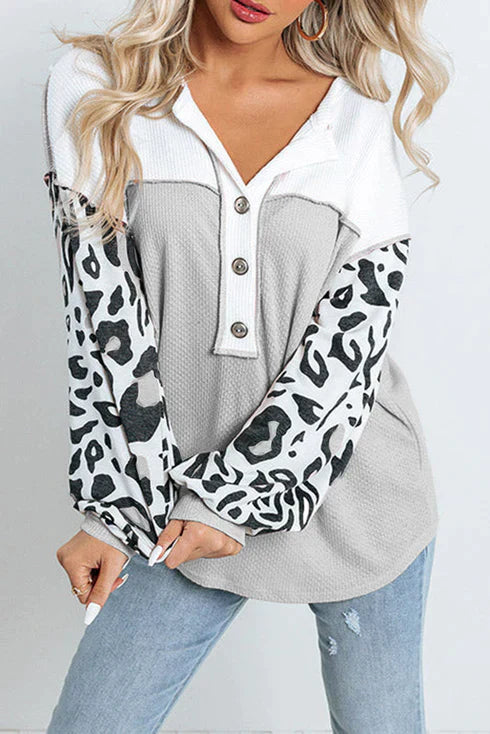 Milou | Top casual patchwork con maniche leopardate