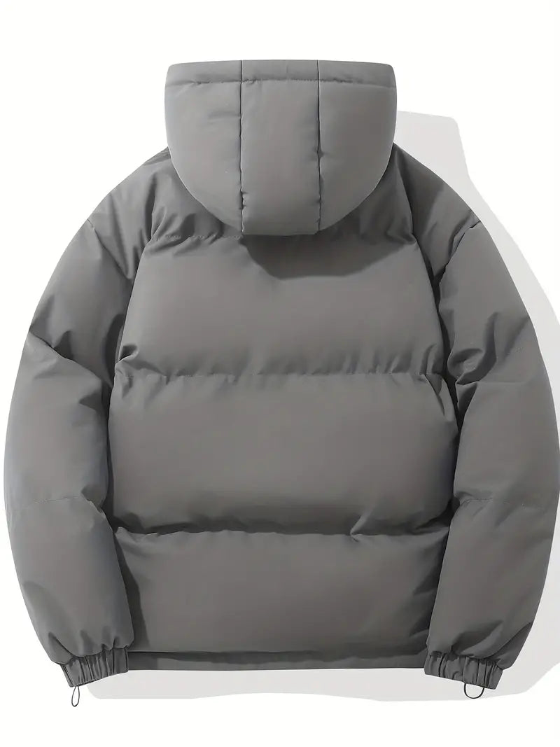 Tijdloze pufferjas die makkelijk te combineren is met verschillende outfits.