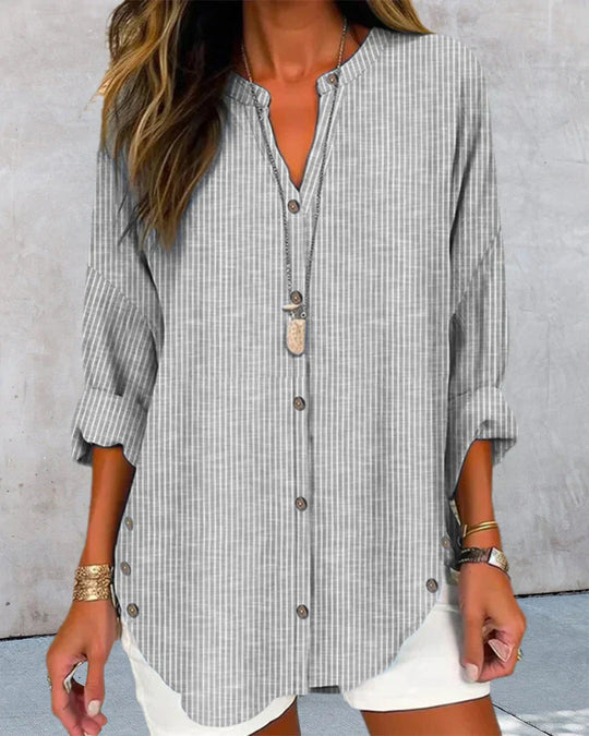 Kristin | Elegante V hals gestreepte blouse