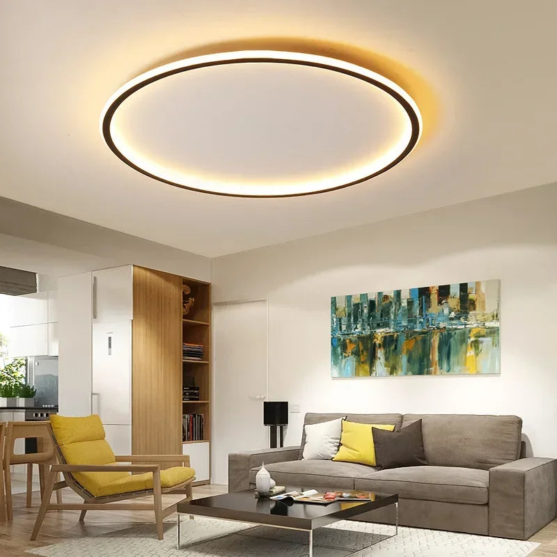 Ronde plafondlamp met minimalistisch LED-design, perfect voor sfeervolle verlichting in de woonkamer.