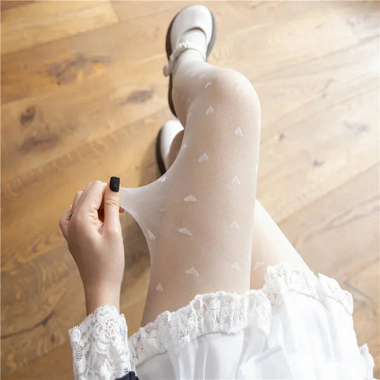 Leah | Modieuze panty met hartjes- en stippenpatroon