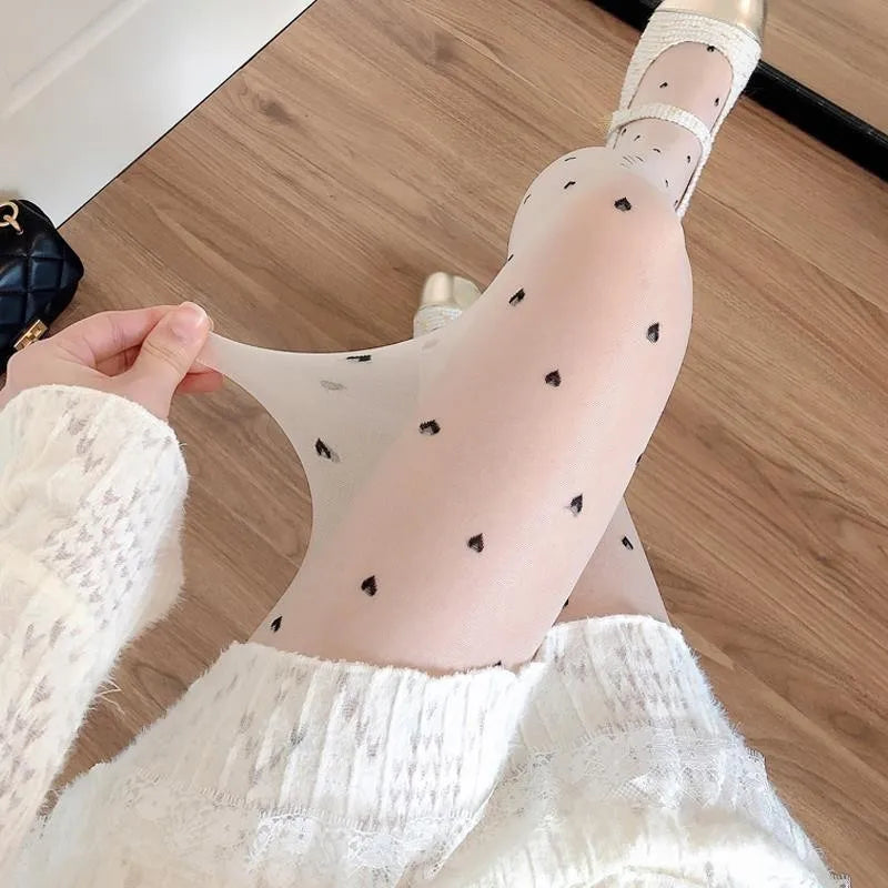 Leah | Modieuze panty met hartjes- en stippenpatroon