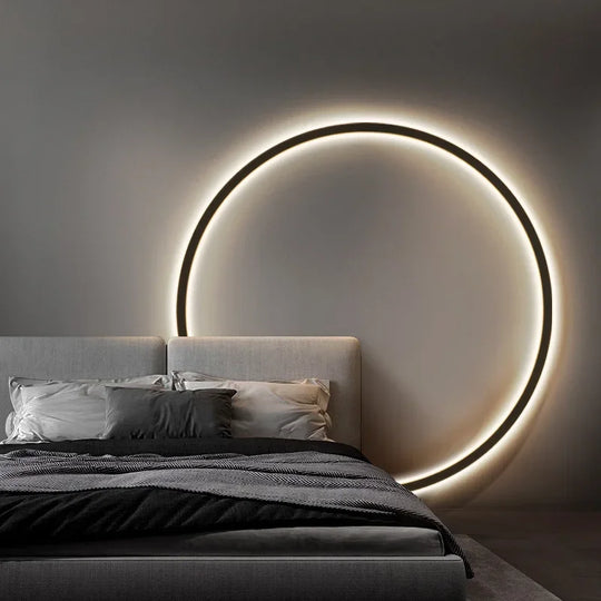 Slaapkamer wandlamp in ringvorm, creëert een moderne en rustgevende ambiance.
