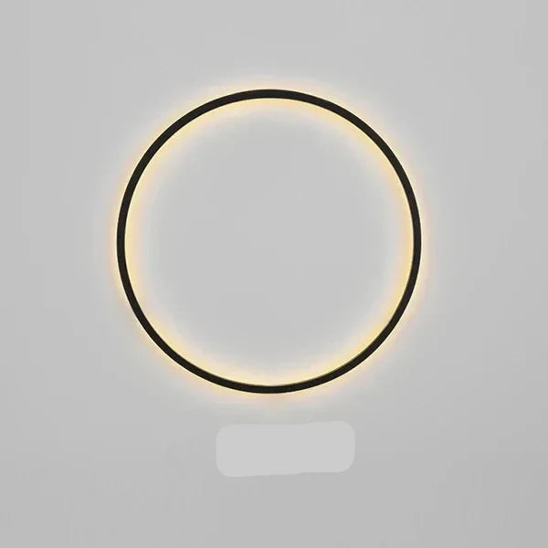 LED wandlamp met een ringvormig design, een verfijnde keuze voor moderne slaapkamerverlichting.