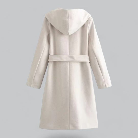 Elegante dames trenchcoat met strikceintuur en oversized capuchon.