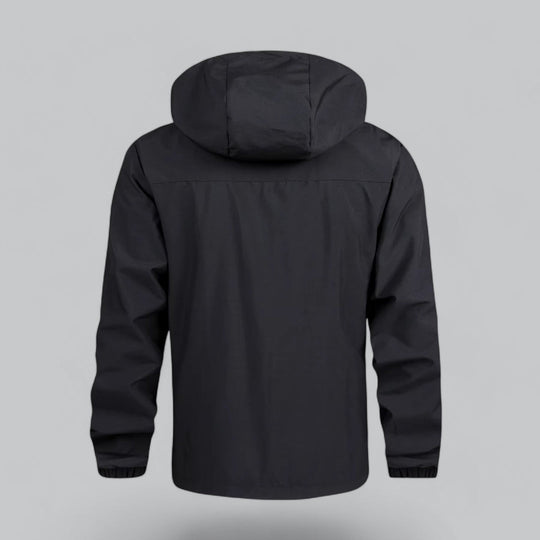 Winddicht herenjack met elastische manchetten voor extra bescherming.
