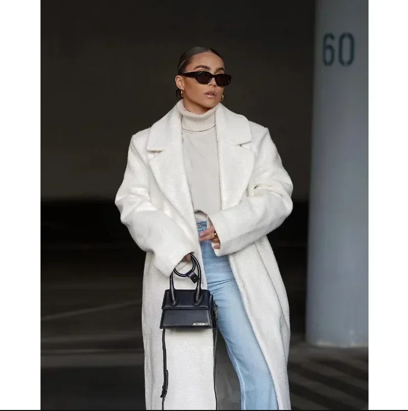 Luxe lange jas perfect voor een verfijnde look.