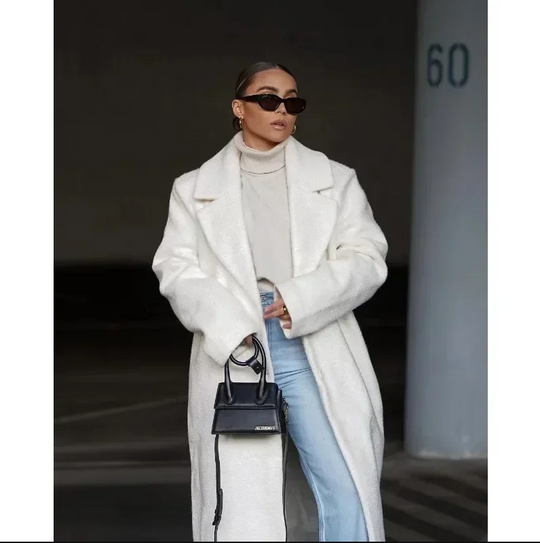 Luxe lange jas perfect voor een verfijnde look.