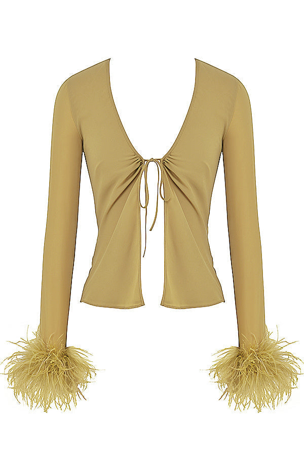 Yara | Design elegante con top in piume