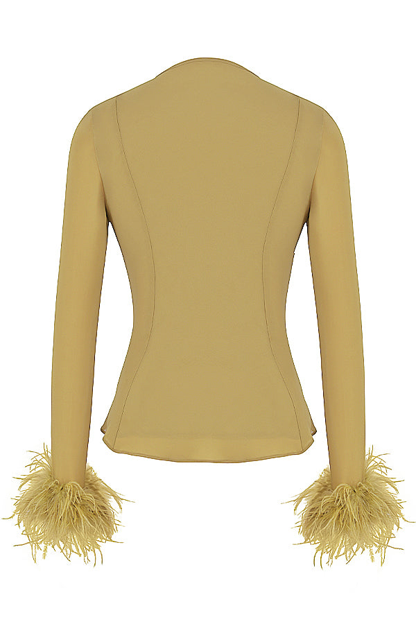 Yara | Design elegante con top in piume