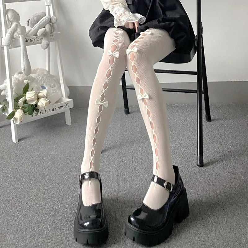 Stefanie | Dijhoge panty met strikdetails