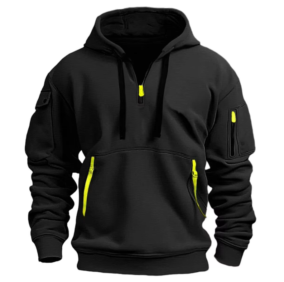 Detailopname van de zak met klittenbandsluiting op de schouder.
