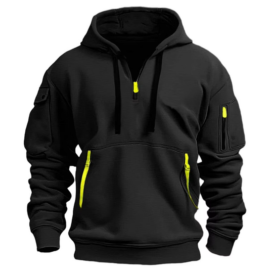 Detailopname van de zak met klittenbandsluiting op de schouder.
