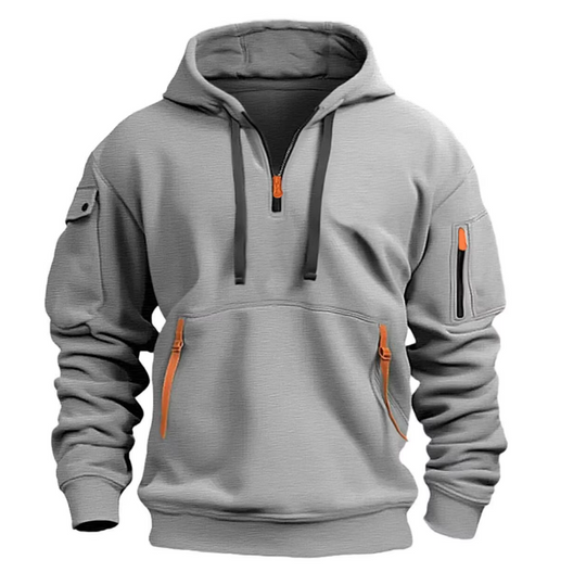 Zwarte Mika Hooded Pullover met felgekleurde accenten op de ritsen.
