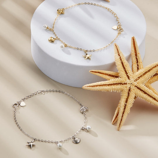 Noor stijlvolle armband met bedels geïnspireerd door de zee, een prachtige keuze voor dames.