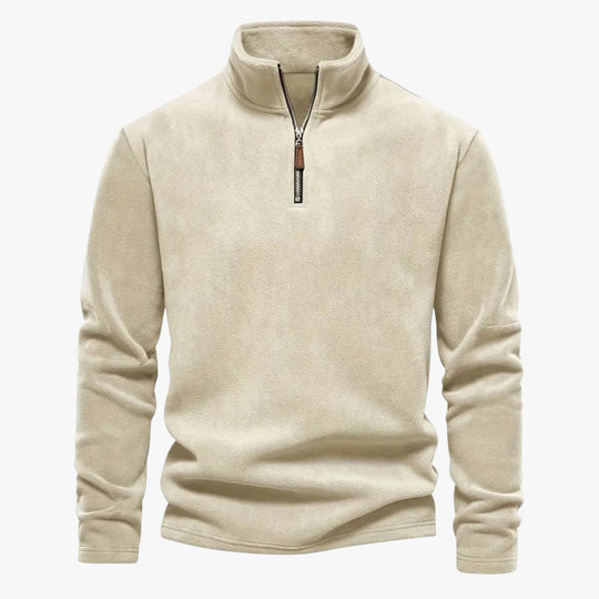 Blauwe sweater gedragen in een casual en moderne setting.
