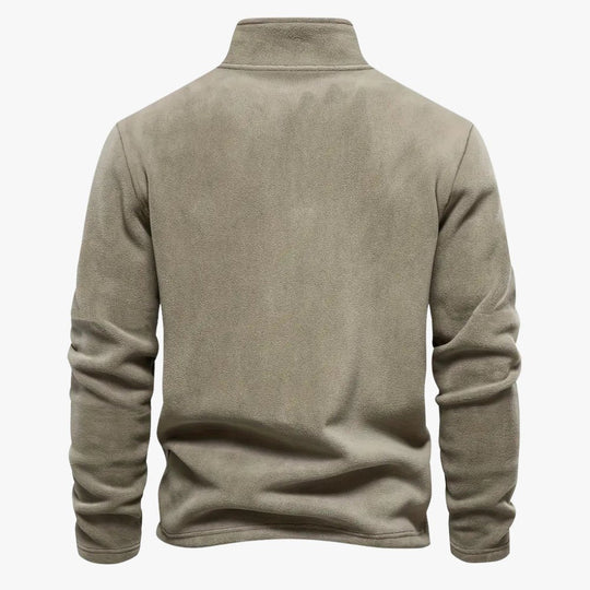 Blauwe half-zip fleece sweater met een klassieke en sportieve uitstraling.
