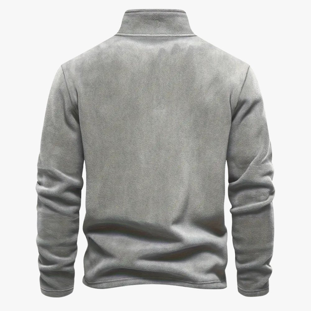 Beige casual sweater met een zachte fleece stof en strakke pasvorm.

