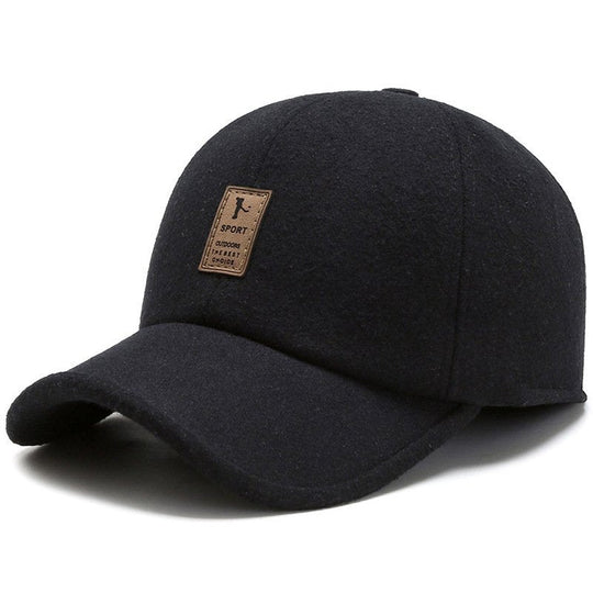 Detail van de ademende materialen van de bruine wintercap.
