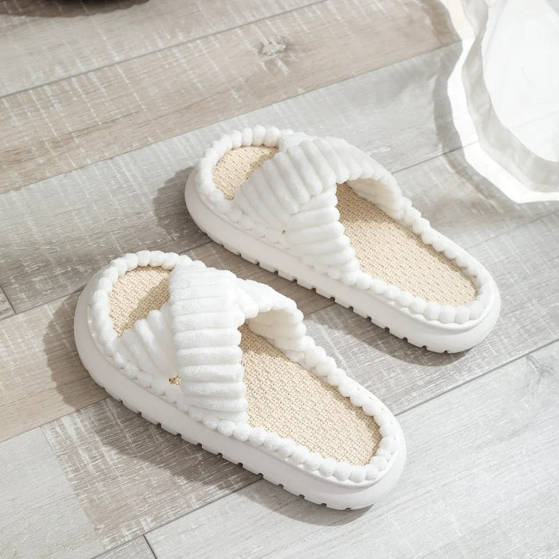 Elegante witte badslippers met open teen en modern design.